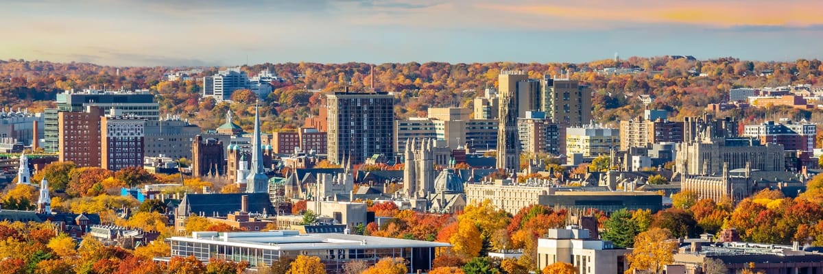 New Haven, Connecticut skyline in the Fall with orange and yellow trees