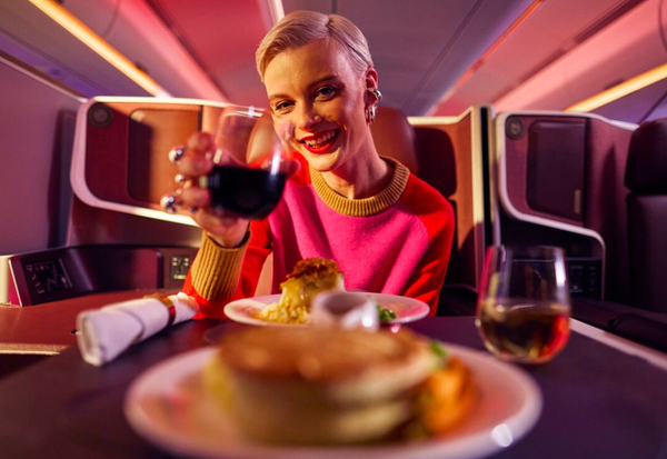 Lady with food in Upper Class