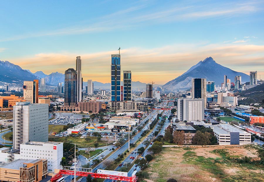 Monterrey skyline with Cerro de la Silla mountain in the background.