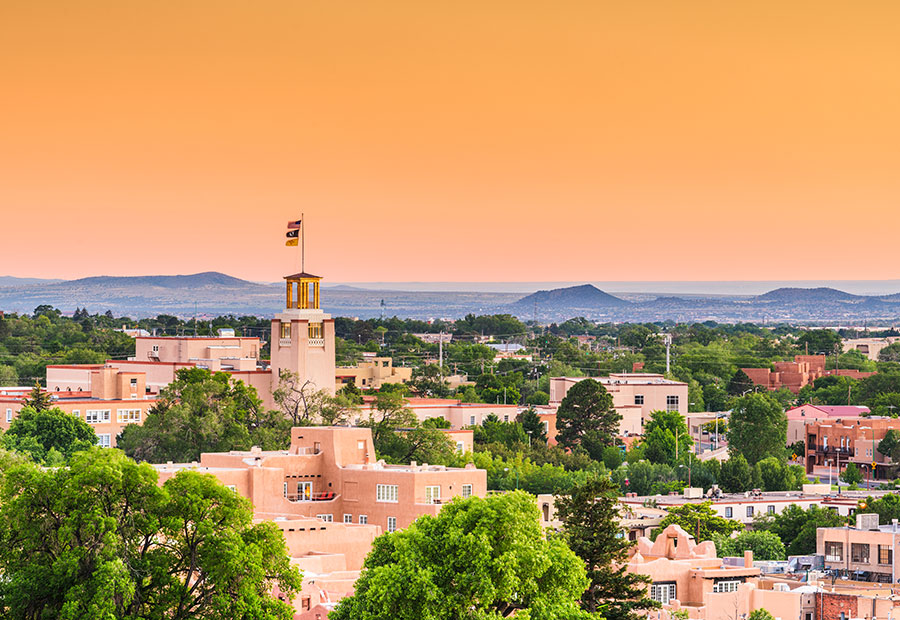 Downtown Santa Fe with mountains in the background.