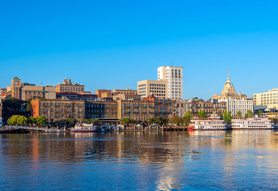 Historic downtown Savannah with the Savannah River in the background.