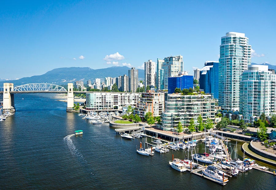 Vancouver waterfront with False Creek and surrounding mountains.