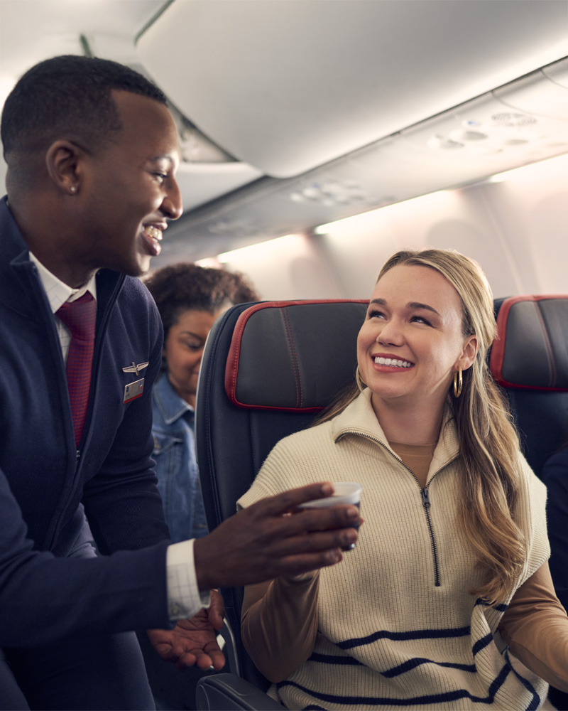 Beverage service in Main Cabin Extra.