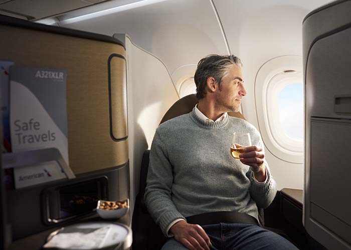 Passenger in Flagship Business seat.