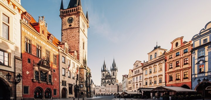Old Town Square in Prague with historical buildings and the astronomical clock.