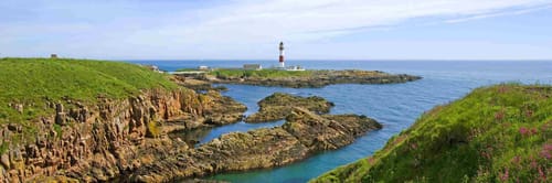 Buchan Ness Lighthouse, off the coast of Boddam, Aberdeenshire, Scotland