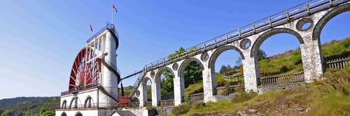 Great Laxey Wheel, also known as Lady Isabella, on the Isle of Man on sunny day