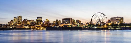 Montreal skyline at dusk, featuring the Grande roue de Montréal