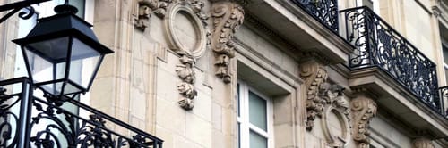 Windows and facade of a classical building in France
