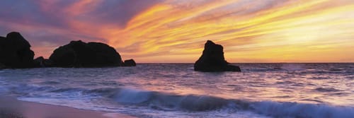 Sunset at Porthcothan Bay in Cornwall, England