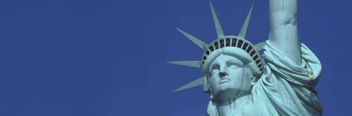 Statue of Liberty against a blue sky