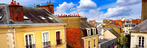 Panoramic view of the rooftops of buildings in Rennes, France.