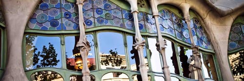 The distinctive facade of Casa Batlló, a renowned building in Barcelona, Spain, designed by Antoni Gaudi.