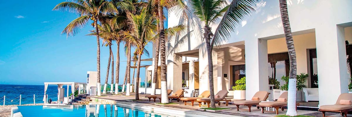 Infinity pool looking out to the ocean at Sunscape Akumal Beach