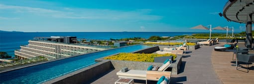 Secrets Bahia Mita rooftop infinity pool with oceanfront views