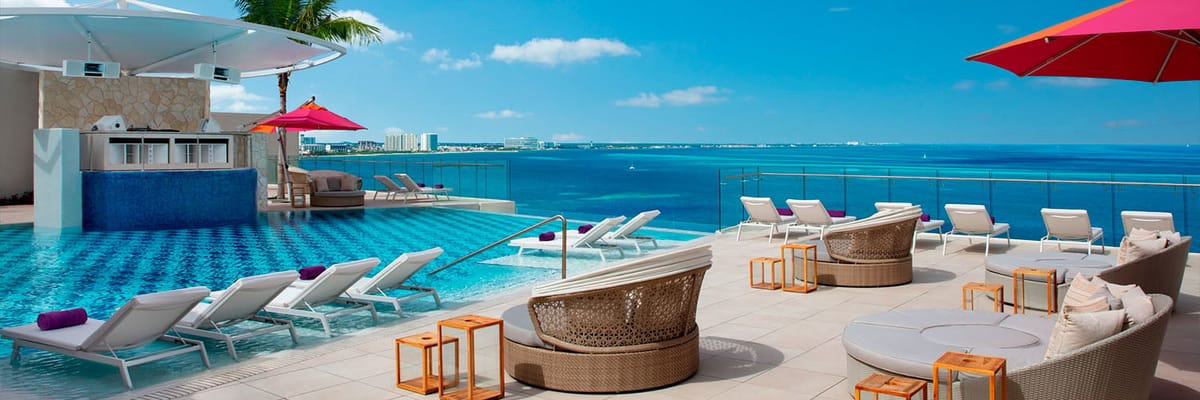 Breathless Cancun Soul rooftop infinity pool with oceanfront views