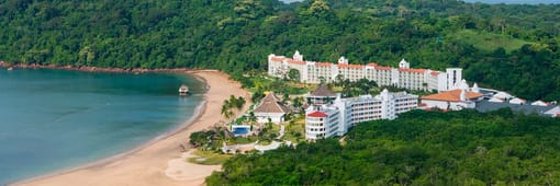 Distant oceanfront aerial view of Dreams Playa Bonita Panama resort