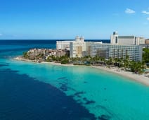 Distant oceanfront aerial view of Dreams Sands Cancun Resort & Spa