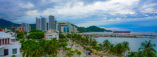 Santa Marta waterfront promenade with sunset and Caribbean coastline