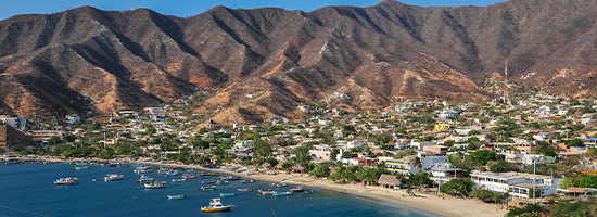 Taganga bay with fishing boats and mountains near Santa Marta Colombia