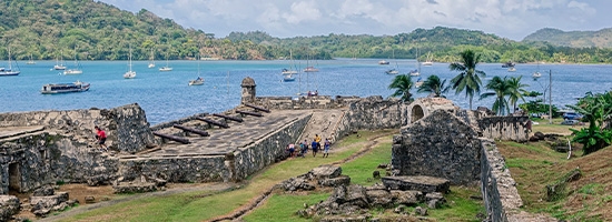 Historic coastal setting and old stone structures in Portobelo, Panama.