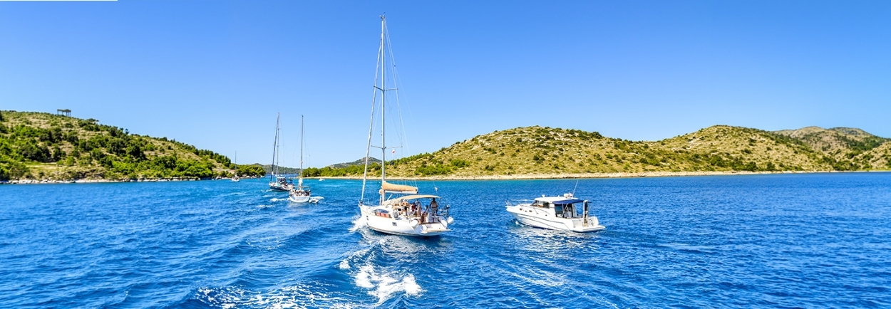 Skier descending snowy mountain