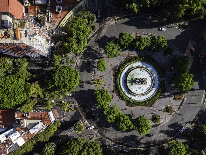 Aerial view of Cibeles fountain in the middle of a park in Roma Norte neighborhood.