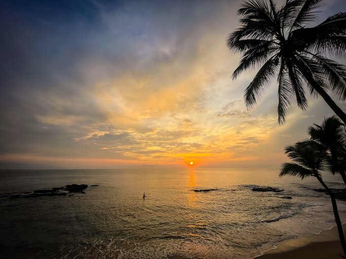 Nuestra Señora de Guadalupe, a historic church in Puerto Vallarta, decorated with colorful traditional flags.