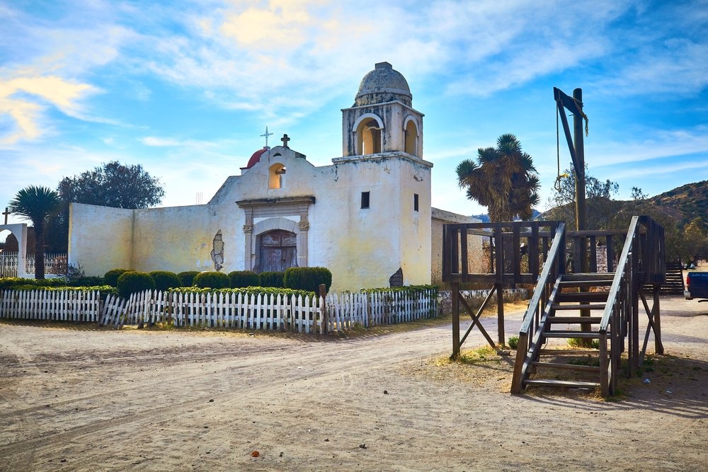 Colonial church and old hanger un Paseo del Viejo Oeste, Durango.