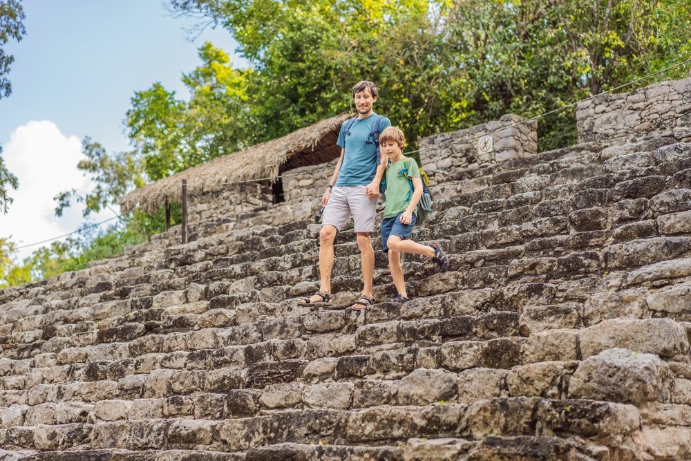 Father and son strolling on El Rey Ruins.