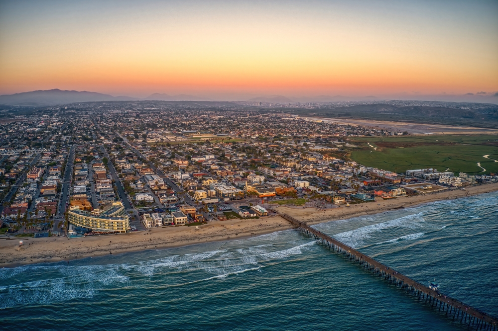 Aerial view of Tijuana’s coastline and the border wall crossing the ocean.