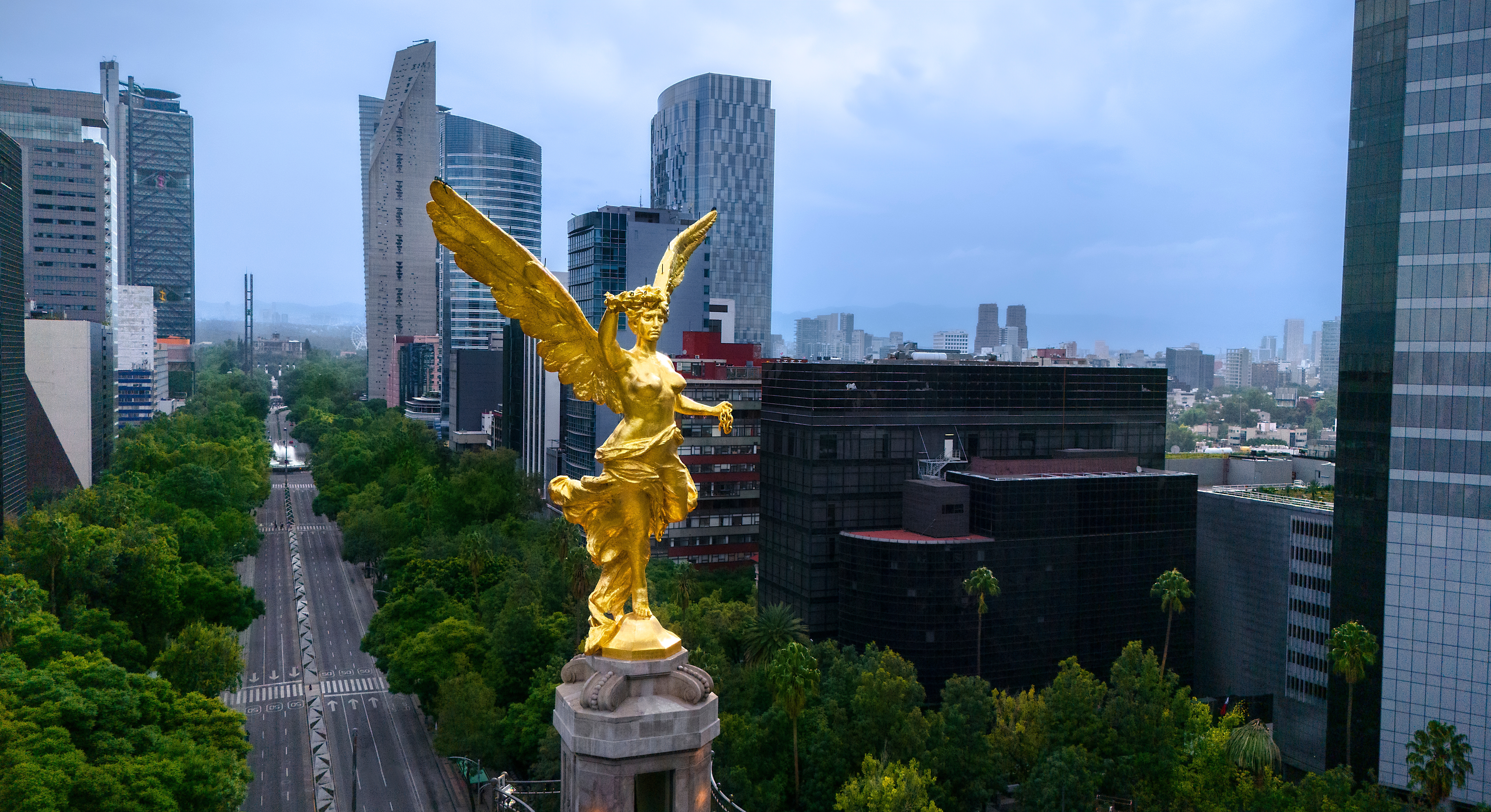 The iconic Angel of Independence monument stands in the middle of Reforma Avenue.