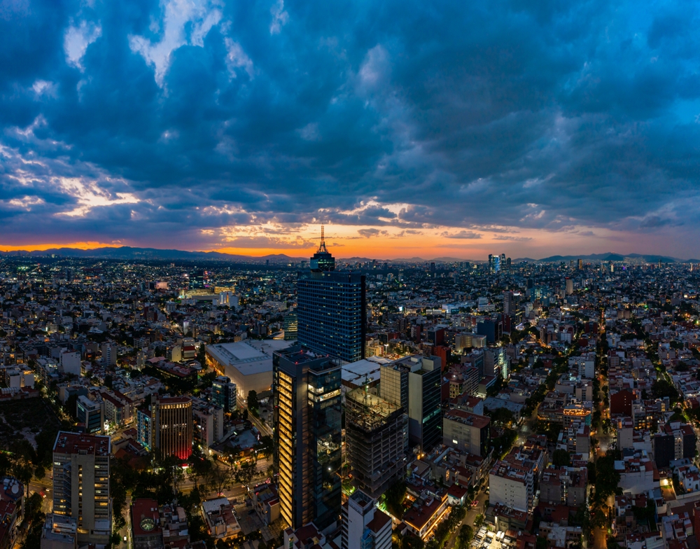 Panoramic aerial view of the iconic World Trade Center building in Mexico City on a day with a beautiful sunset