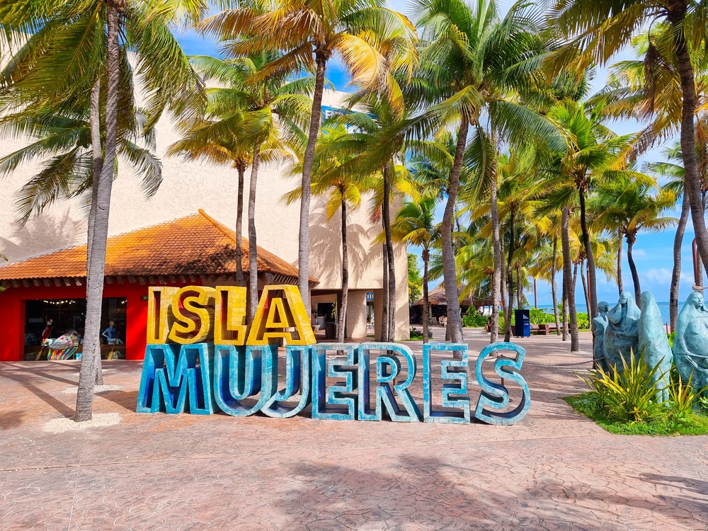 Isla Mujeres sign at the beach.