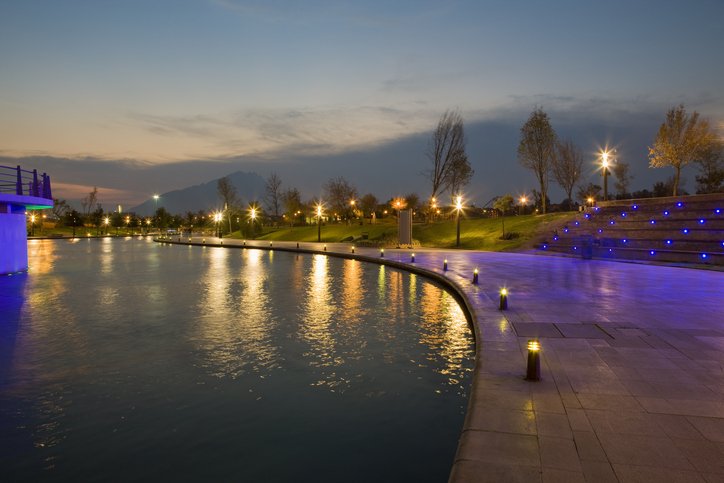 Santa Lucía Riverwalk and Fundidora Park at night.
