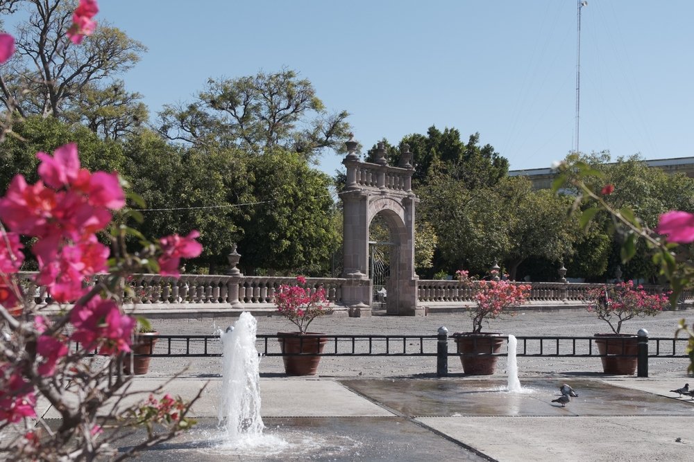 Front entrance to Jardin de San Marcos on a sunny day.