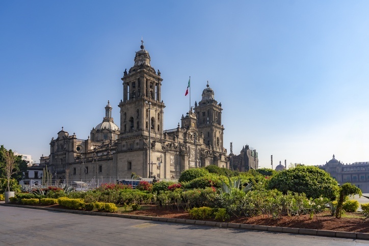 A building within Chapultepec forest with Mexico’s flag hanging from the rooftop.