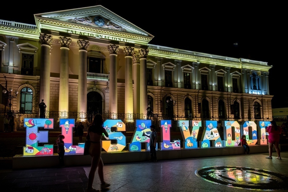 El Salvador sign in front of the National Palace in San Salvador’s historic center.